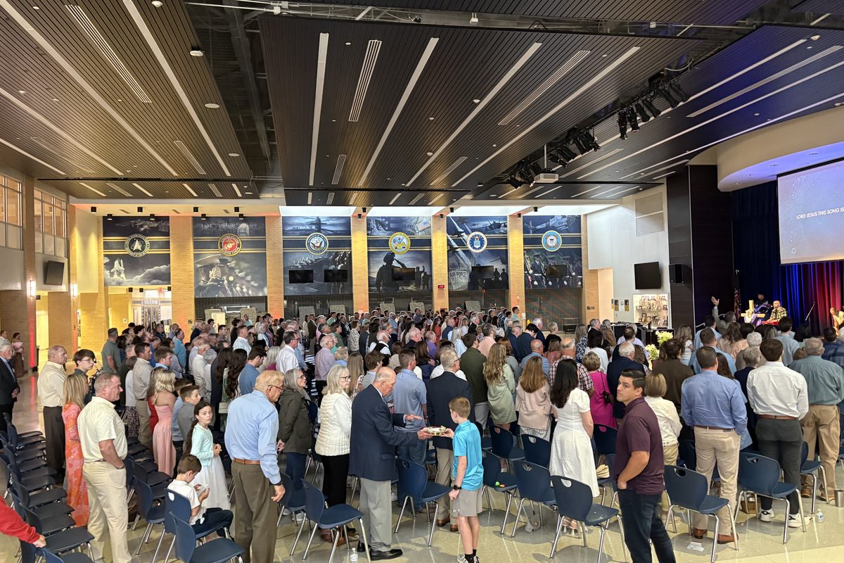 A congregation in worship at a new campus